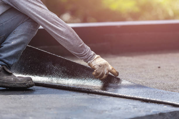 Professional Waterproofing technician working in Rosewood, OH